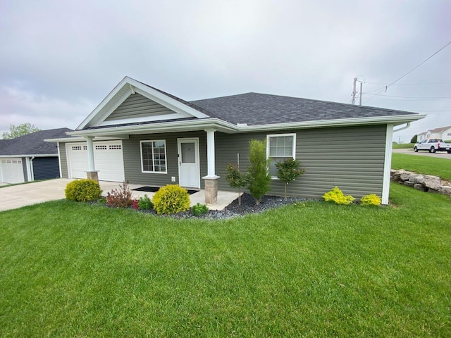 200 Malone Ave, Bellefontaine, OH 43311 - view of front of property with a garage, concrete driveway, a front lawn, and a shingled roof