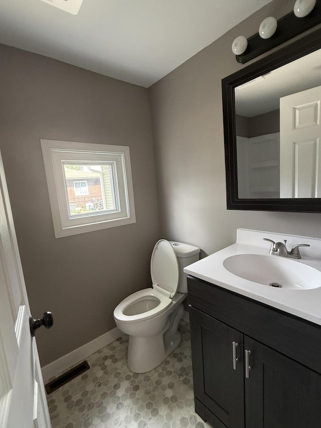 158 E Walnut St, Rockford, OH 45882 - bathroom with vanity and toilet