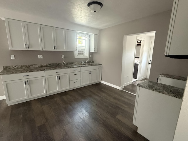158 E Walnut St, Rockford, OH 45882 - kitchen featuring white cabinetry, dark wood-style flooring, and dark countertops