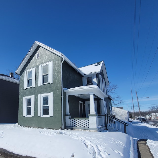 view of snow covered property