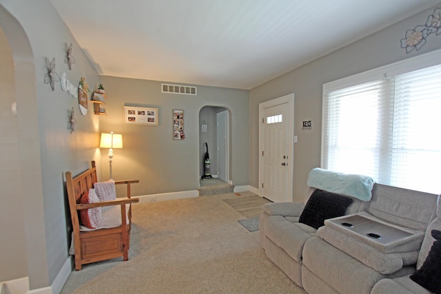 1508 Nicklin Ave, Piqua, OH 45356 - carpeted living room with arched walkways and baseboards
