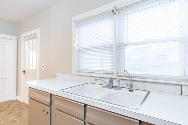 kitchen with sink and a wealth of natural light