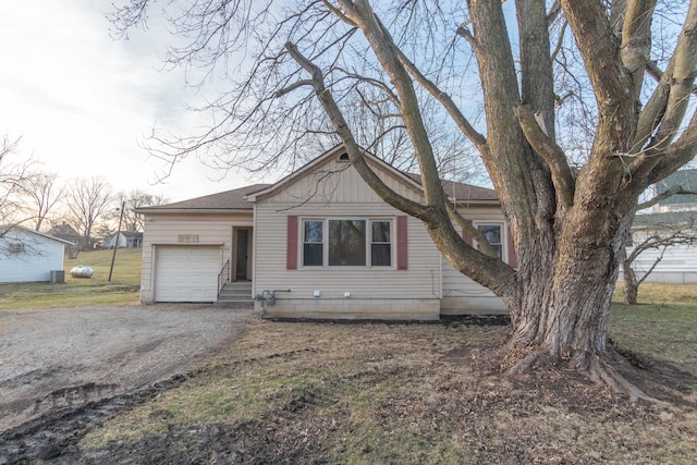 single story home featuring a garage