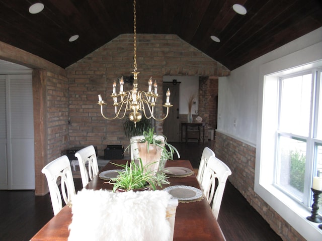 dining room with vaulted ceiling, brick wall, dark wood-type flooring, and wooden ceiling