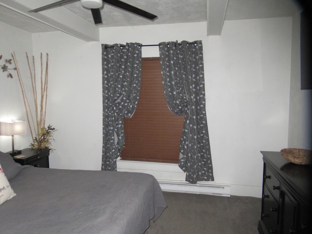 bedroom with beamed ceiling, carpet floors, a baseboard heating unit, and ceiling fan