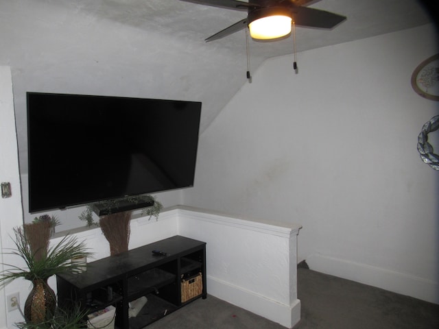 carpeted living room with lofted ceiling and ceiling fan