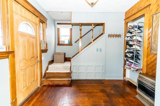 foyer entrance with dark wood-type flooring and stairs