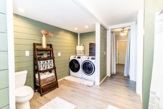 laundry area featuring a ceiling fan, light wood-type flooring, recessed lighting, and washer and clothes dryer