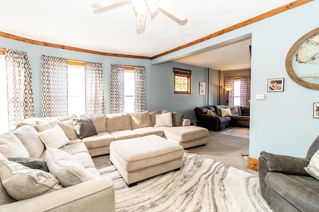 living room featuring ceiling fan and carpet flooring