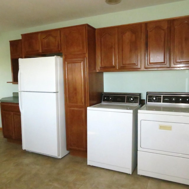 laundry area featuring laundry area and washer and clothes dryer