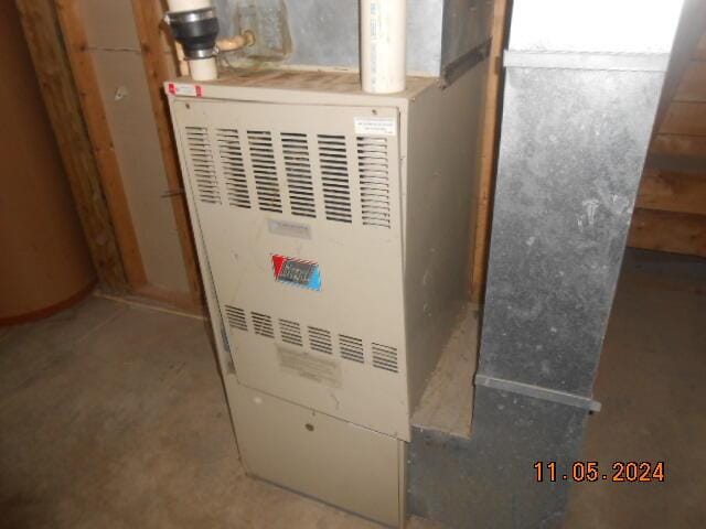 utilities featuring heating unit and water heater