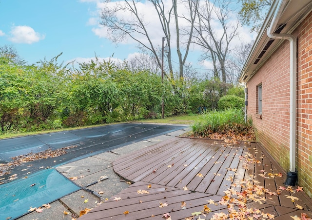 deck with a covered pool