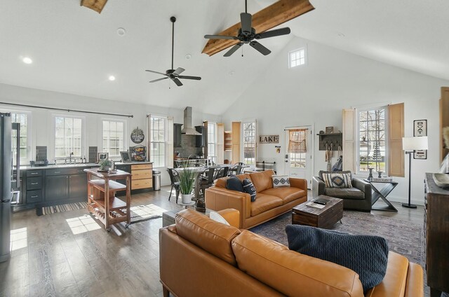 9436 Cottonwood Dr, Huntsville, OH 43324 - living room featuring high vaulted ceiling, wood finished floors, ceiling fan, and recessed lighting