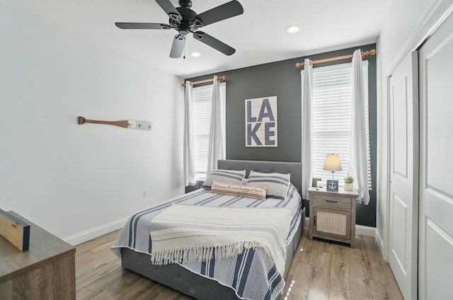 9436 Cottonwood Dr, Huntsville, OH 43324 - bedroom featuring recessed lighting, a closet, baseboards, and light wood-style floors