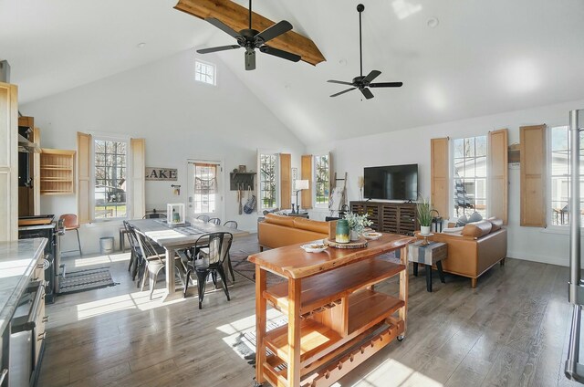 9436 Cottonwood Dr, Huntsville, OH 43324 - living room with visible vents, light wood finished floors, ceiling fan, and high vaulted ceiling