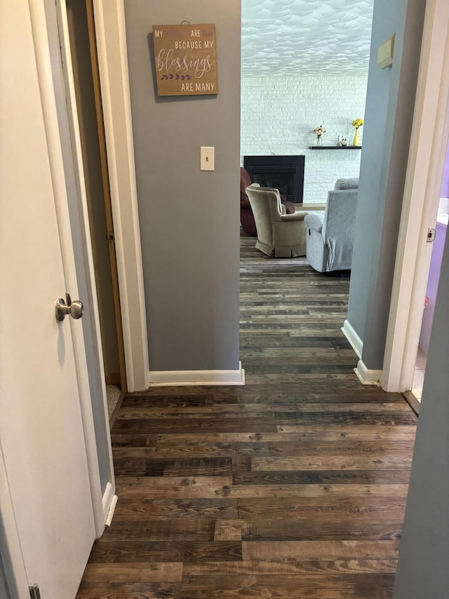 825 Dorothy Ln, Saint Marys, OH 45885 - hall with dark wood finished floors and baseboards