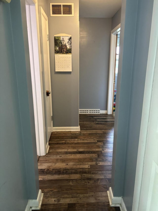 825 Dorothy Ln, Saint Marys, OH 45885 - hall featuring dark wood-style flooring and baseboards
