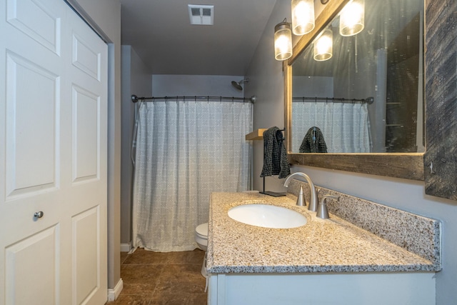 bathroom featuring tile patterned flooring, toilet, vanity, visible vents, and a shower with curtain