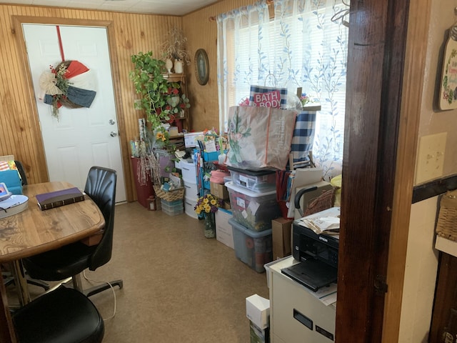 office area featuring wooden walls