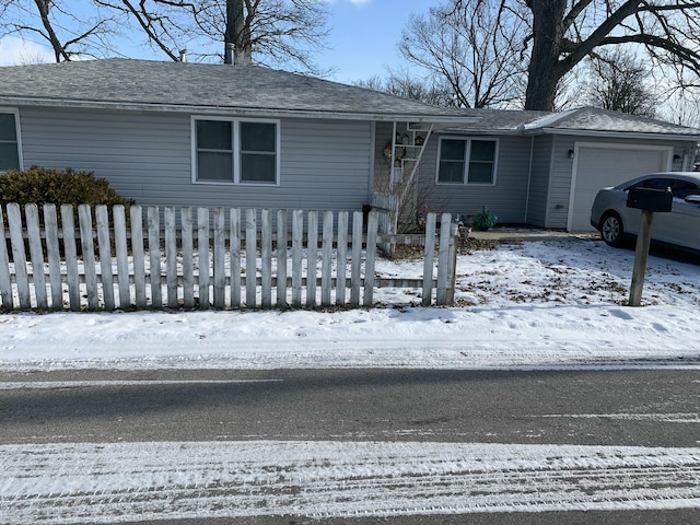 view of front of home featuring a garage