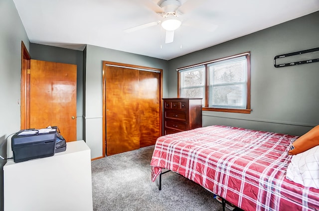 bedroom with a closet, carpet flooring, and ceiling fan