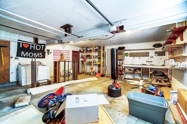 garage with washer / dryer and a garage door opener