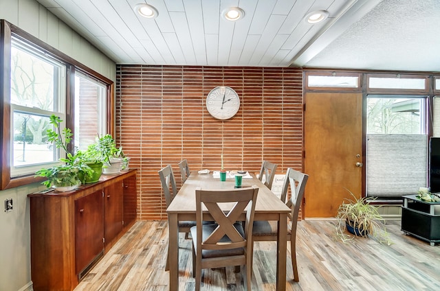 dining room featuring light wood-style floors, recessed lighting, and wooden ceiling