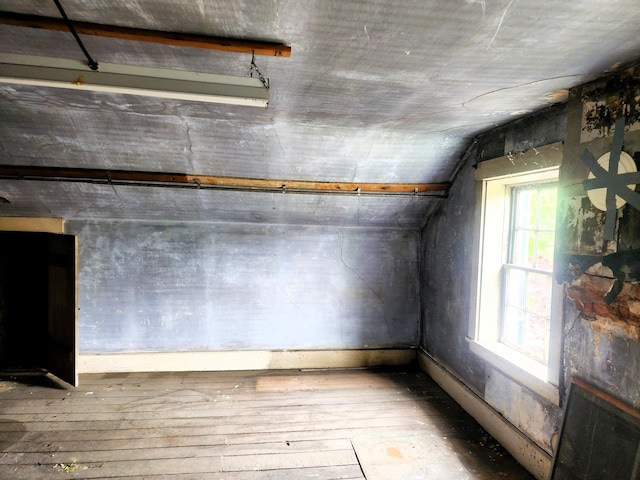 120 N Perry St, Saint Marys, OH 45885 - spare room featuring vaulted ceiling and hardwood / wood-style flooring