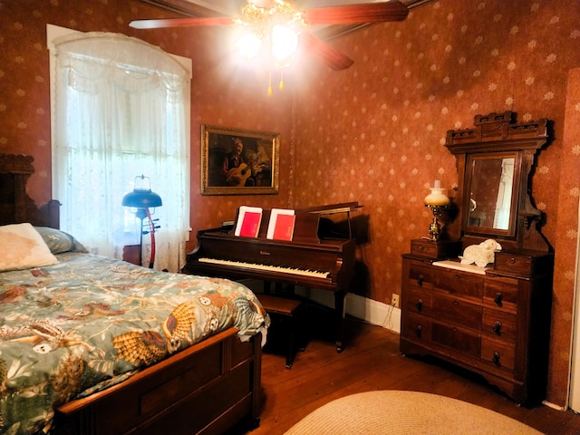 120 N Perry St, Saint Marys, OH 45885 - bedroom featuring hardwood / wood-style flooring, wallpapered walls, and a ceiling fan