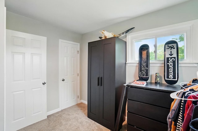 walk in closet featuring carpet
