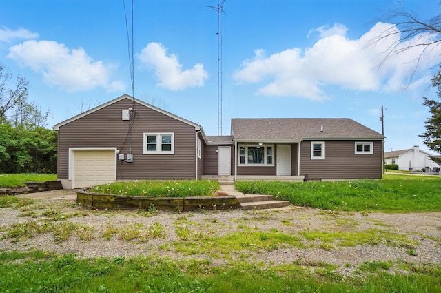 single story home featuring an attached garage