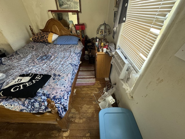 bedroom featuring wood finished floors