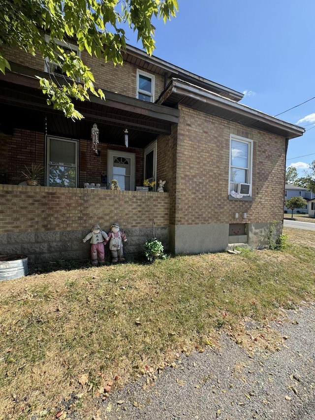 view of front of home with brick siding