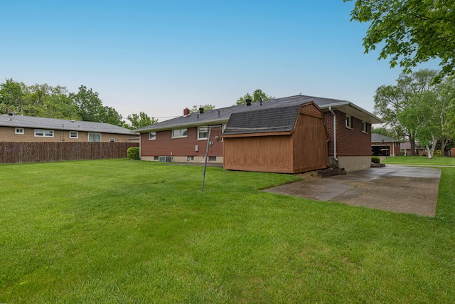 4833 Mesa Ln, Springfield, OH 45503 - view of yard featuring a patio and a storage shed