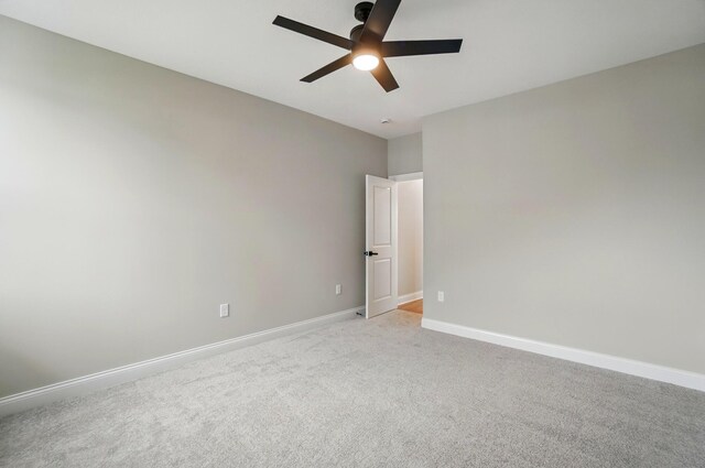 1505 Kingsgate Rd, Springfield, OH 45503 - spare room with a ceiling fan, light carpet, and baseboards