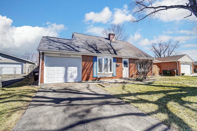 view of front facade featuring a front lawn, aphalt driveway, an attached garage, brick siding, and a chimney