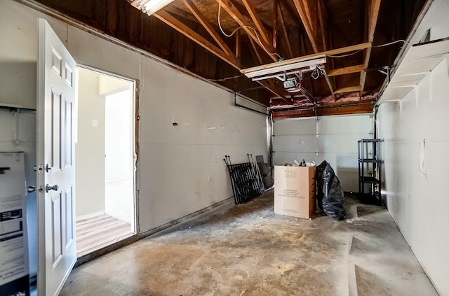 garage with french doors and a garage door opener