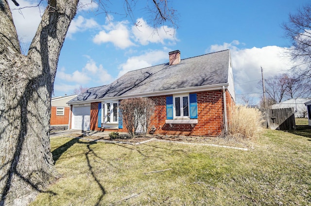 rear view of house with brick siding, a shingled roof, a lawn, a chimney, and an attached garage