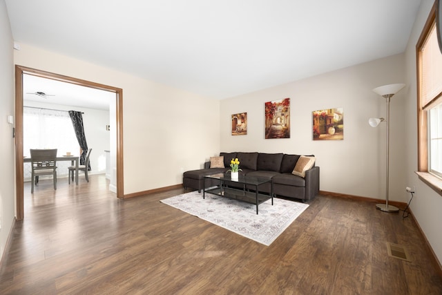 living room featuring dark hardwood / wood-style floors