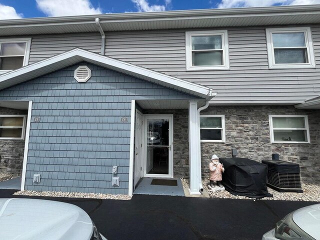 9638 State Route 368 Unit C6, Huntsville, OH 43324 - doorway to property featuring stone siding