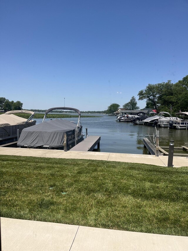 9638 State Route 368 Unit C6, Huntsville, OH 43324 - dock area with a lawn, a water view, and boat lift