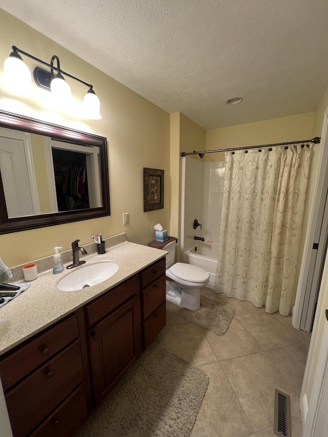 2732 Summer Field Trl, Sidney, OH 45365 - bathroom featuring vanity, shower / bathtub combination with curtain, a textured ceiling, and tile patterned floors