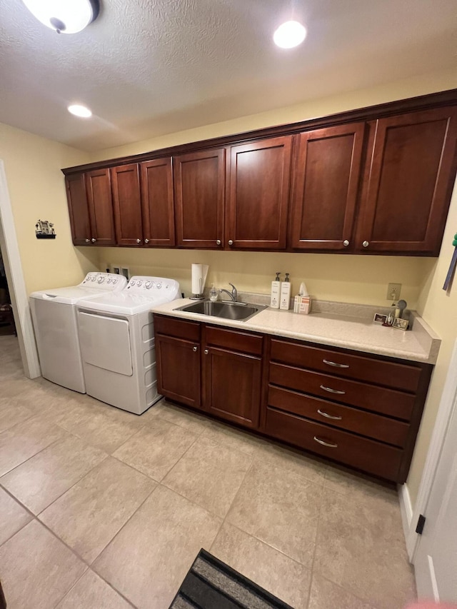 2732 Summer Field Trl, Sidney, OH 45365 - laundry room with cabinet space, independent washer and dryer, recessed lighting, and light tile patterned flooring