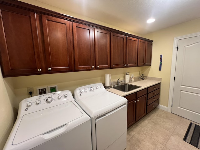 2732 Summer Field Trl, Sidney, OH 45365 - laundry area featuring cabinet space, washer and clothes dryer, light tile patterned floors, and recessed lighting