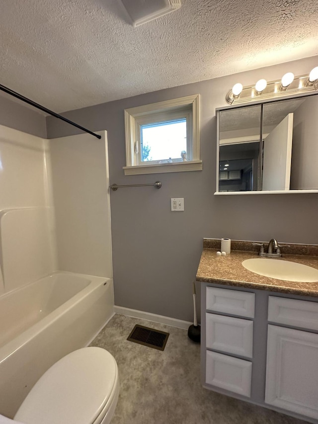 full bathroom featuring vanity, a textured ceiling, shower / tub combination, and toilet