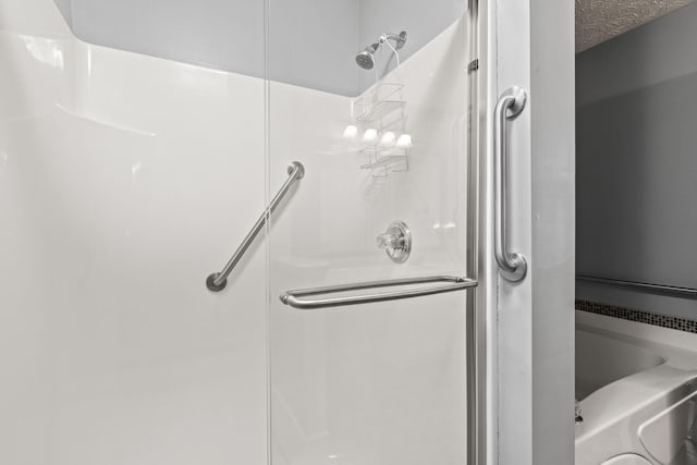 full bath featuring a stall shower