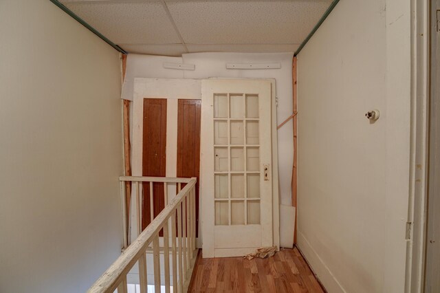corridor with wood finished floors