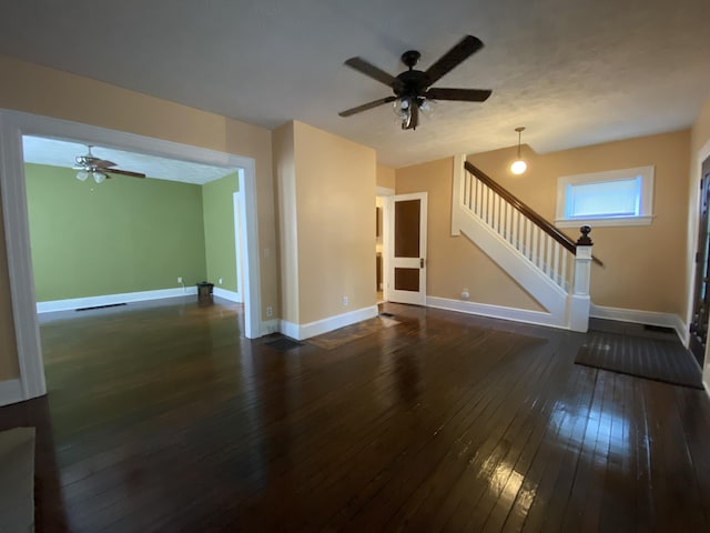 1208 Broadway St, Springfield, OH 45504 - unfurnished living room featuring hardwood / wood-style flooring, stairs, and ceiling fan