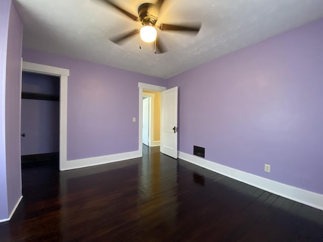 1208 Broadway St, Springfield, OH 45504 - empty room featuring dark wood-type flooring and ceiling fan
