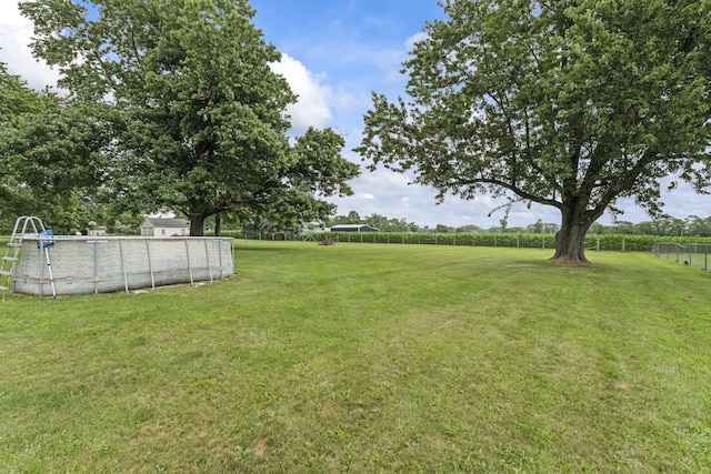 5899 N Springcreek Stringtown Rd, Piqua, OH 45356 - view of yard featuring an outdoor pool